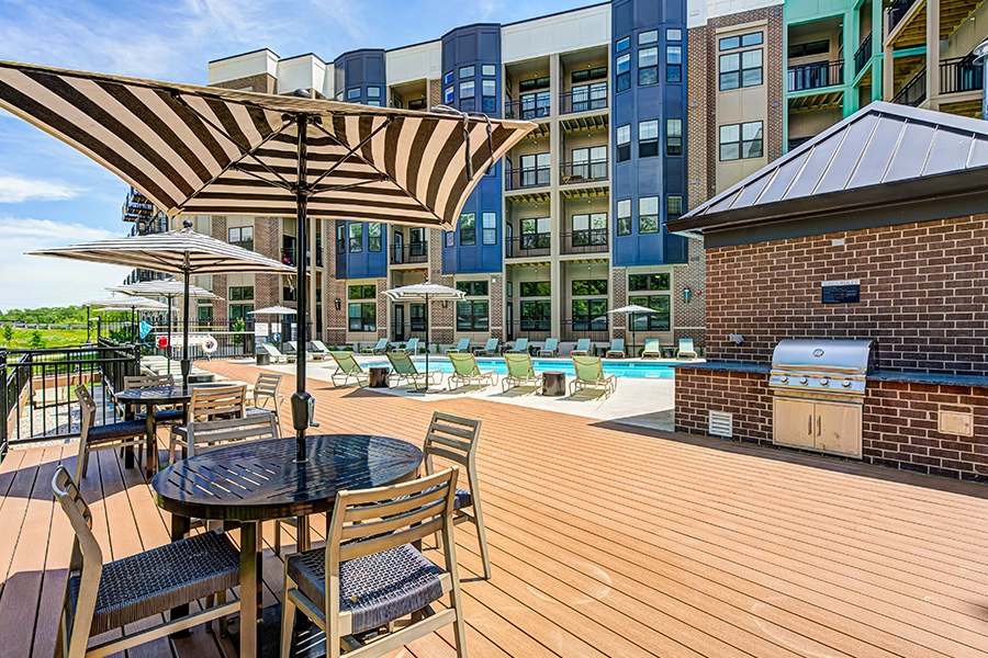 View of the pool and exterior of East Bank Apartments